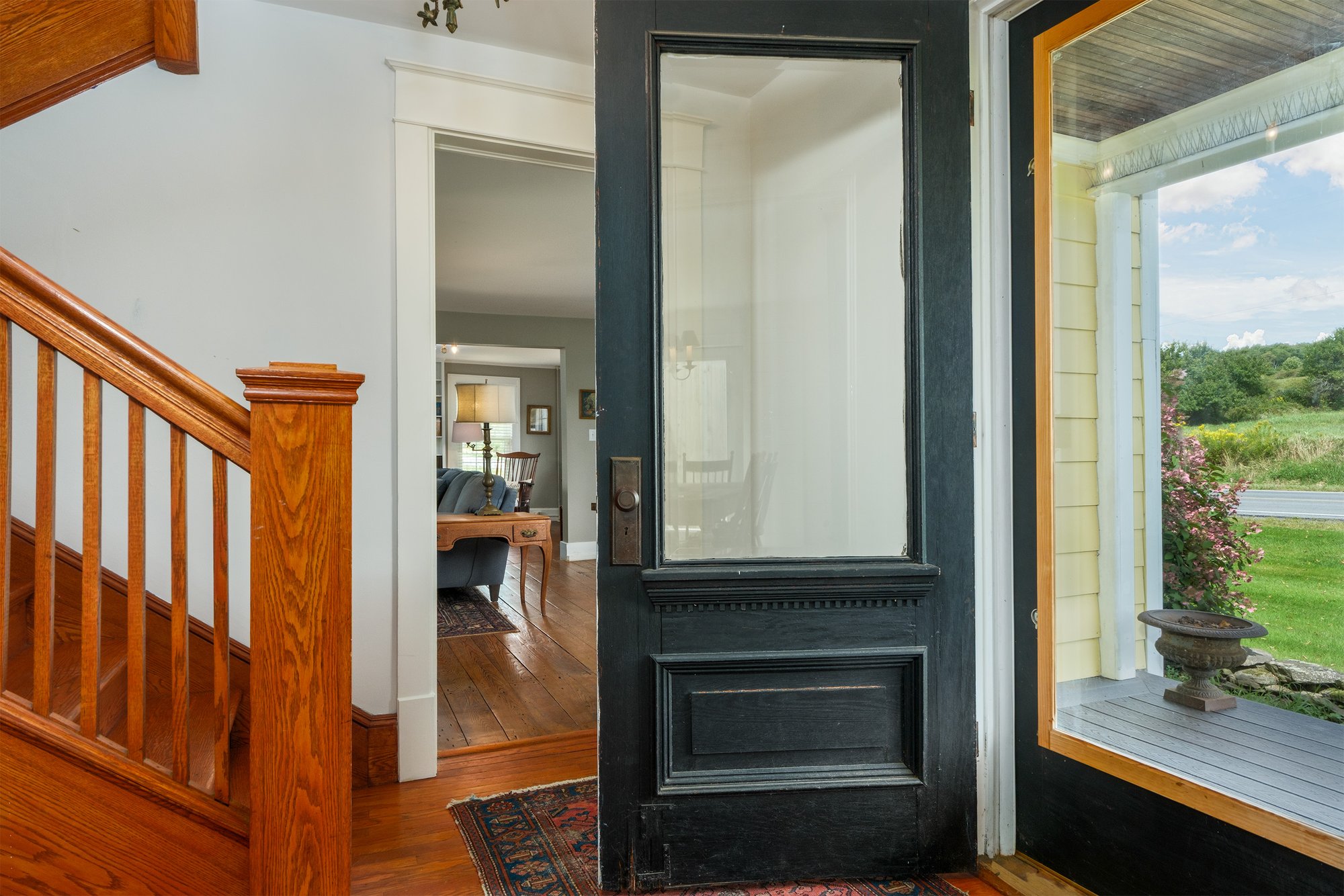 008 Front door and covered porch -- 11440 County Highway 14
